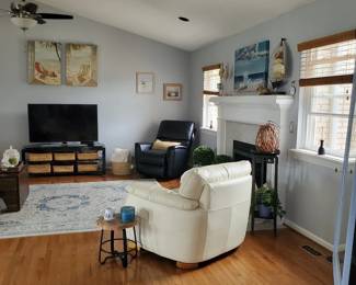 Black recliner and TV owner is keeping 