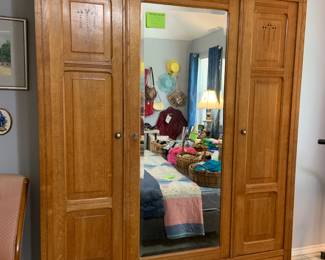 large wardrobe with mirrored door