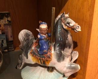 Thelma Frazier Winter large ceramic sculpture of a child on a carousel horse 