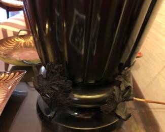 Detail base of bronze lamp