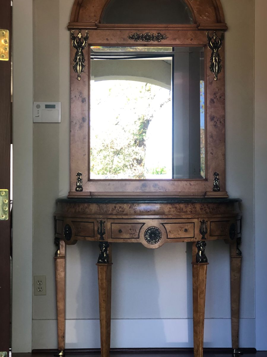 Stunning Burl Wood and Ormolu/Brass Demilune Console with Green Marble Top and matching Mirror.   Total Height with Table and Mirror combined is approximately 92" tall.                 