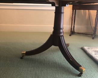 Pedestal feet have small casters.