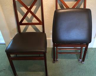 Showing Cosco Chair folded on left.