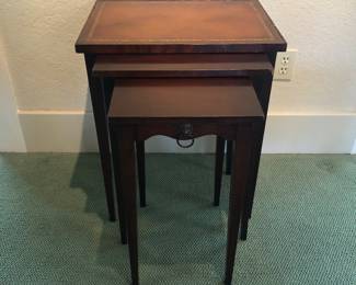 Nesting Tables. Larger table has leather top.
