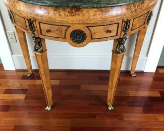 Showing close up of Demilune Table.  Approximate Table Dimensions: H:35in | L: 41.1/2in | D: 22.1/2in. 