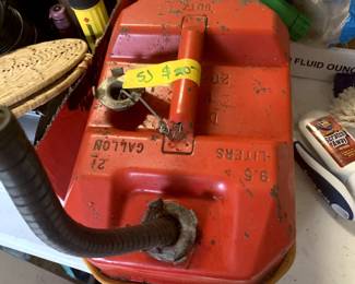 #411 vintage small metal gas can $25.00