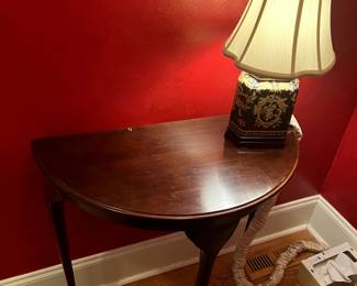 #384 Bombay Half-Moon Table w/q/a Legs - 28"x14"x29" $100.00
