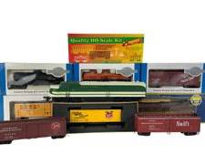 Assorted HO Scale Model Trains Including Proto 2000 Series E6 Locomotive, Bachmann Silver Series Cars, Roundhouse Miller High Life Box Car, Pennsylvania Electric Locomotive and More!