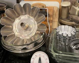 Assorted Kitchen: Oster Blender, Pyrex Measuring Cups, Hamilton Beach Milkshake Machine, Black & Decker Electric Knife, Kenmore Hand Mixer, Keurig Coffee Machine, Bakeware and more...