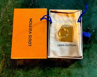 Louis Vuitton Nanogram Phone Ring Holder
$160