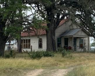 This is the grandparents house that sits on top of the hill. Has been shut up for 50 years (since they passed away). Full of Antiques).