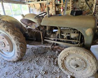 1946 9N Tractor has a jeep motor. Runs off gas . Yes it runs!