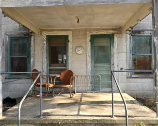 Grandparents Farmhouse sits on top of the hill. Has been locked up for 50 years 