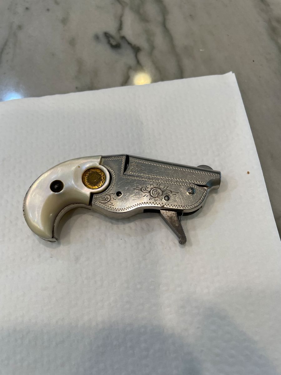 Hopkins & Allen genuine vest derringer, very rare, good condition. 