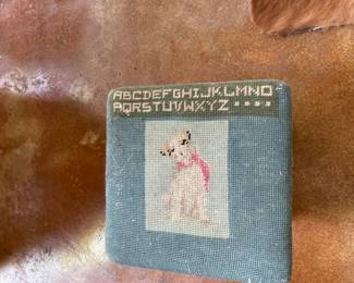 small foot stool with vintage needlepoint