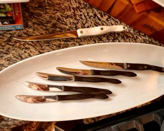  4 CUTCO steak knives and  2 other CUTCO knives