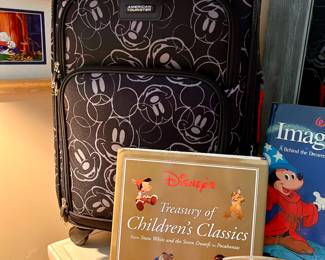 Disney carryon suit case and Disney books 