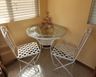 Heavy cast iron bistro table with 2 chairs