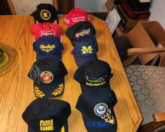 Numerous ball caps