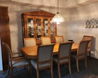 Has matching lighted hutch and serving table