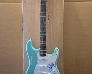 #10524 • The Osmonds Autographed Electric Fender Squier Guitar
