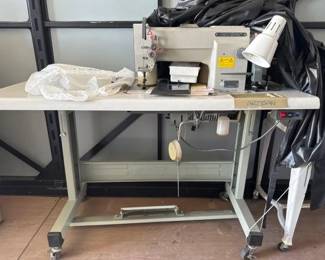 #24620 • Rolling Sewing Machine
