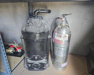 #12188 • Vintage Oakland Foundry Co Warm Air Furnace and Fyr-Fyter Fire Extinguisher
