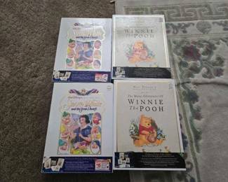 #60058 • 4 Disney Exclusive Deluxe Video Edition of Snow White and Winnie the Pooh
