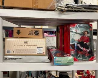 #10156 • 9 Coca Cola Barbies and 1 Coca Cola Train set
