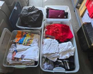 #12086 • (4) Totes of Shirts and Sweaters
