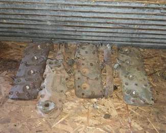 #2306 • (3) Ford Flathead V8 Heads, (1) Intake Manifold, and (1) Exhaust Manifold
