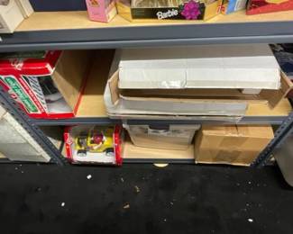 #10186 • 2 Shelves of Christmas Dolls and Toys
