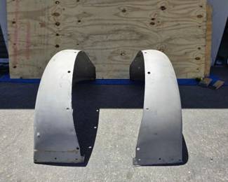 #22256 • Two Early Model Fenders
