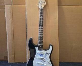 #10514 • Jimmy Buffet Autographed Electric Fender Squier Guitar
