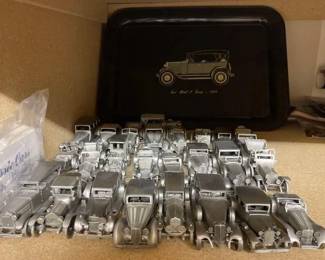 #50056 • 25 Pewter Early Model Cars and a Ford Model Aluminum Tray
