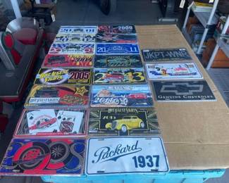 #6552 • 25 Advertising License Plates
