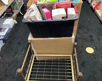 #10172 • 1 Tote 1 Box of Dolls and Baby Doll Bed frame
