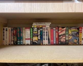 #50102 • 24 VHS Movies and 3 DVDs
