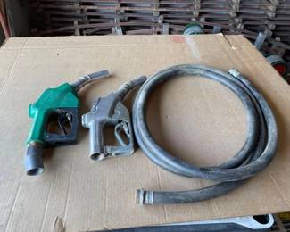 #6591 • Gas Pump Hose and Two Nozzles
