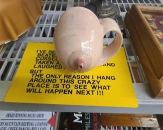 #1002 • Novelty Cup, Plastic Sign, and Lingerie
