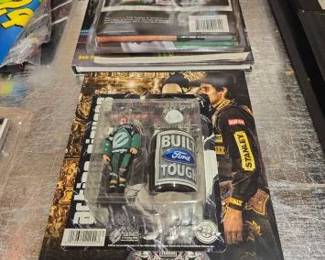 #20746 • PBR Rodeo clown toy , PBR book & Nascar books, banner
