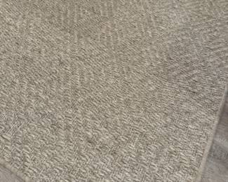Woven fiber rug              13' x 13' rubber backing
