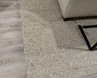 Woven fiber rug              13' x 13' rubber backing