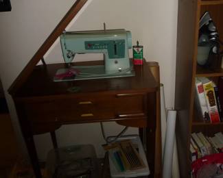 Singer sewing machine with cabinet