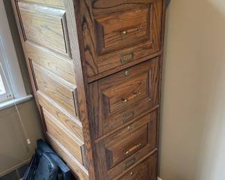 Wooden file cabinet.