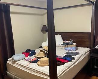 Four-poster bed frame.