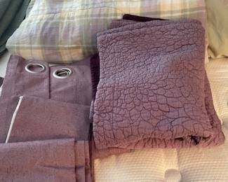 PURPLE comforter, drapes and pillow shams.