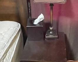 Small end table, lamp and tissue box.