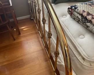 Brass bed.