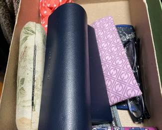 Eyeglasses and cases.